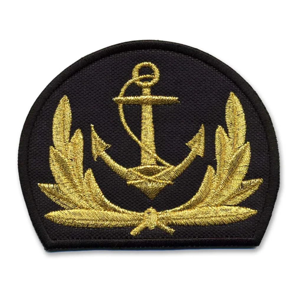 Mylar anchor cap badge